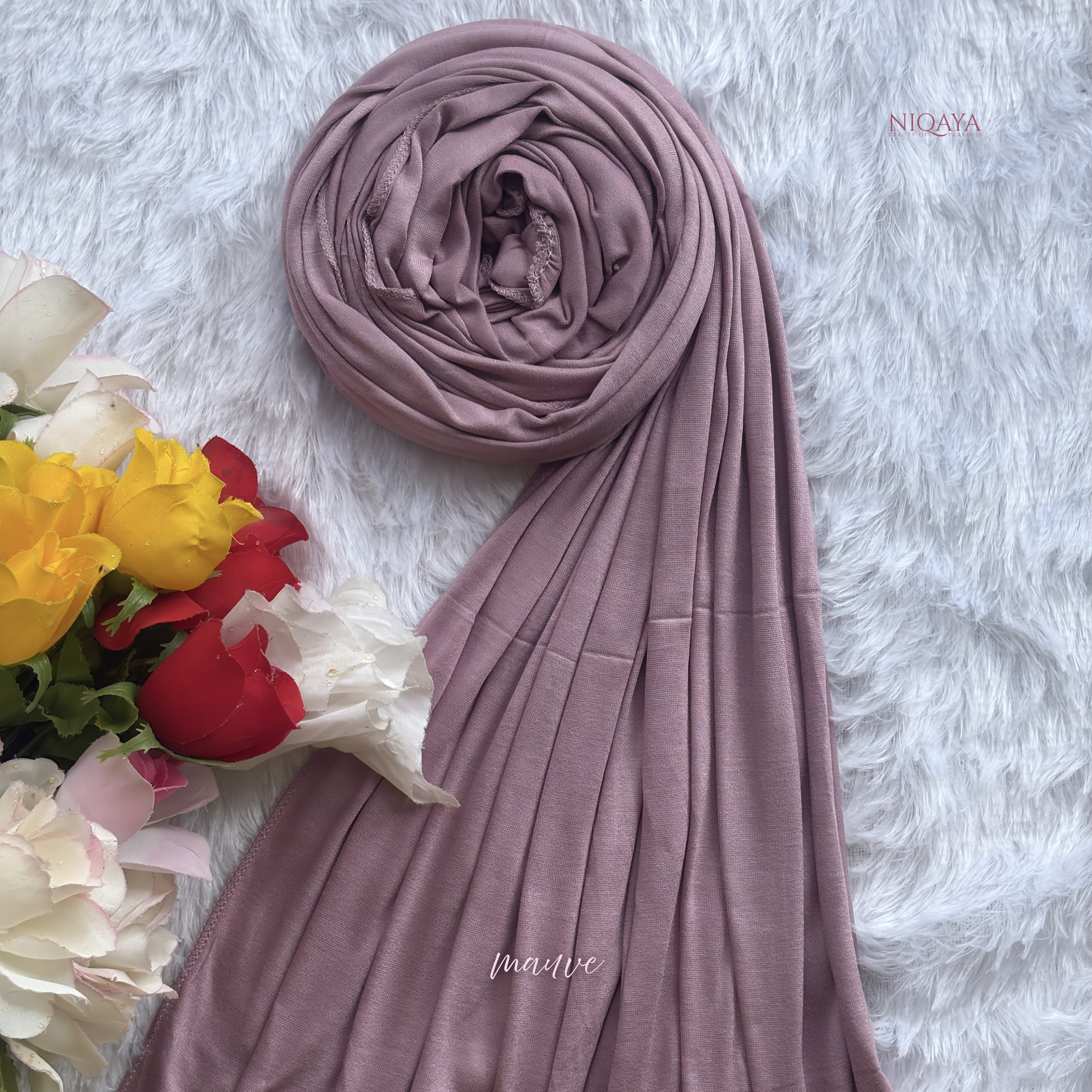 Mauve hijab with flowers on a white textured background